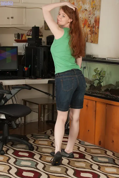 Abbey Rain: Busty Redhead Strips Out of Her Shorts and Spreads Her Pussy – photo 2 of 21