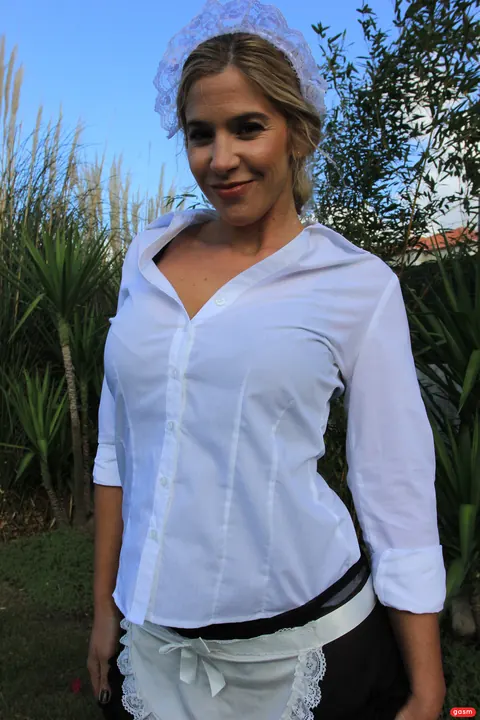 CAROL FERRER: Blonde with Big Tits Poses in a Maid Uniform Outdoors – photo 9 of 15