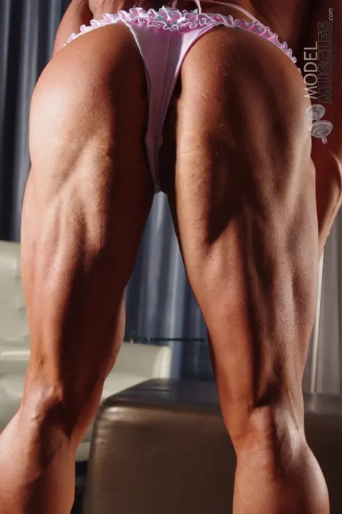 Athletic Woman Flexes Her Muscles in a Pink Bikini at the Gym – photo 11 of 20