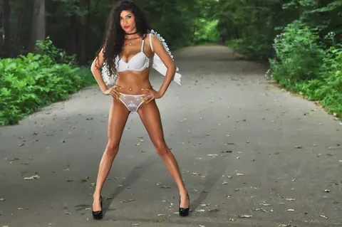 Curly Busty MILF Flaunts Lingerie and Heels Outdoors – photo 2 of 12