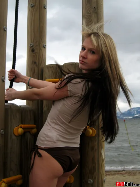 Blonde PAWG Poses in a Top and Bikini Bottoms on the Beach – photo 5 of 12
