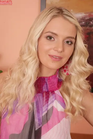 European Blonde Fingers Her Pussy on the Sofa