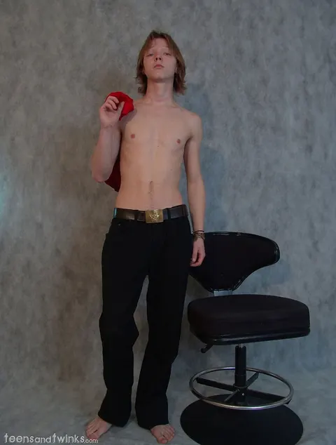 Slim Brunette Twink Poses Naked in a Chair – photo 2 of 21