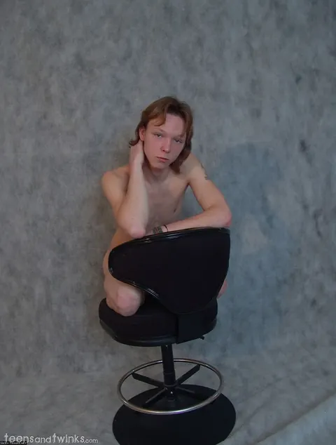 Slim Brunette Twink Poses Naked in a Chair – photo 8 of 21