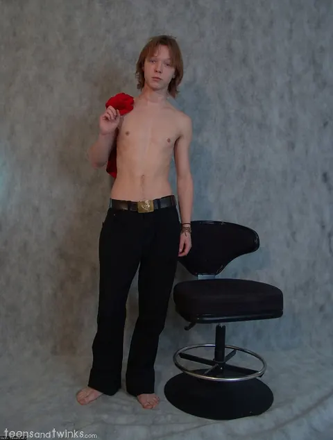 Slim Brunette Twink Poses Naked in a Chair – photo 1 of 21