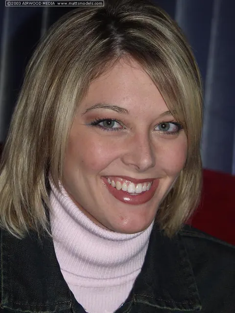 Blonde Amateur Reveals Lingerie Under Turtleneck Sweater – photo 1 of 16