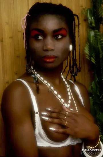 Ebony Babe in Lingerie and Stockings Takes a Facial After Sex