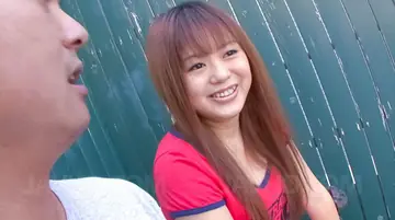 Japanese Brunette Kneels and Gives a Blowjob