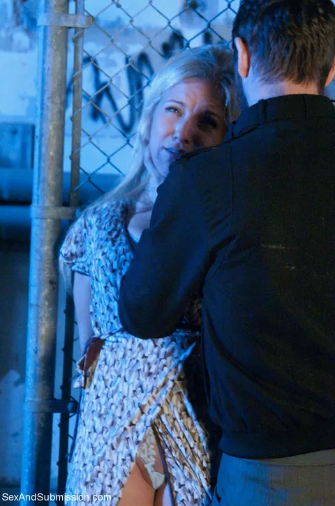 Dia Zerva: Mature Blonde in Glasses Gives a Blowjob While Bound Outdoors – photo 6 of 16