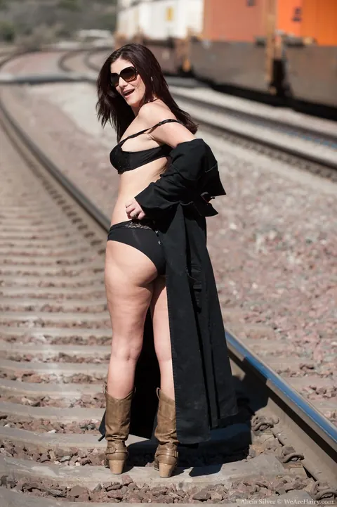 Alicia Silver: Thick Blonde MILF in Glasses Shows Her Hairy Pussy on Railway Tracks – photo 8 of 17