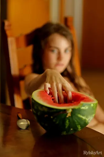 European Brunette Eats Watermelon Nude with Tattoos and Hairy Bush