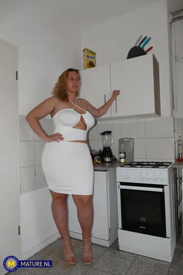 Curvy Russian MILF in a Dress Sucks and Fucks Repair Guy in the Kitchen
