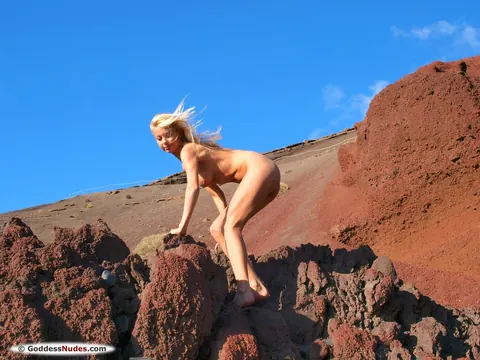 Woman Undresses Fully and Poses Nude Standing – photo 16 of 21