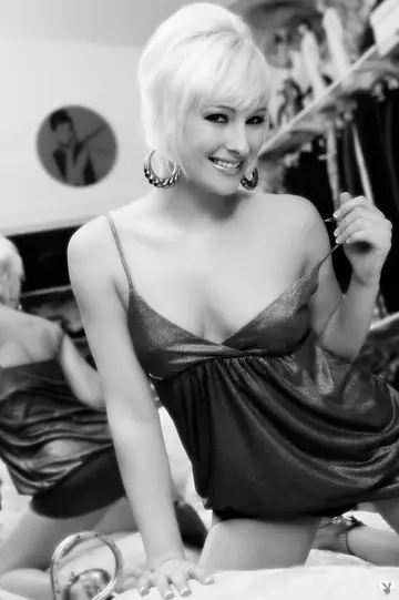 Short-Haired Blonde Lies Back and Spreads Her Pussy Wide