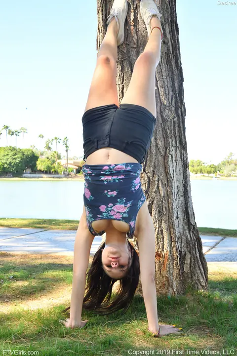 Black-Haired Woman Fingers Herself in Shorts at the Park – photo 8 of 21