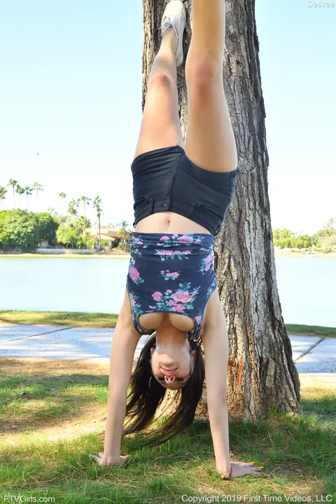 Black-Haired Woman Fingers Herself in Shorts at the Park – photo 10 of 21