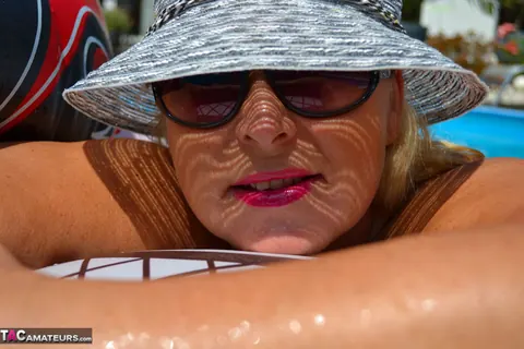 Nudechrissy: European Blonde MILF Poses Poolside with Big Tits – photo 13 of 19