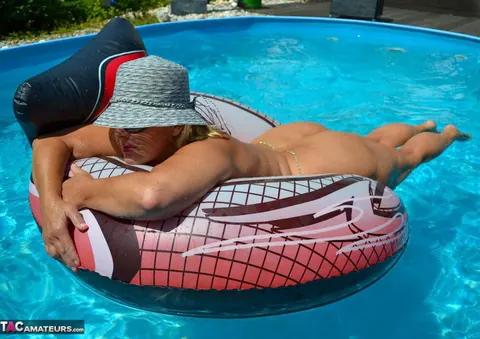 Nudechrissy: European Blonde MILF Poses Poolside with Big Tits – photo 12 of 19