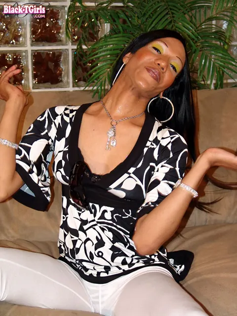Ebony Trans Woman Undresses, Turns, and Shows Hard Cock – photo 8 of 16