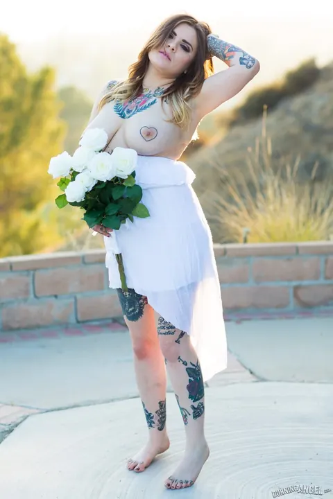 Farrah paws: Tattooed Brunette with Big Natural Tits Strips Outside – photo 6 of 15