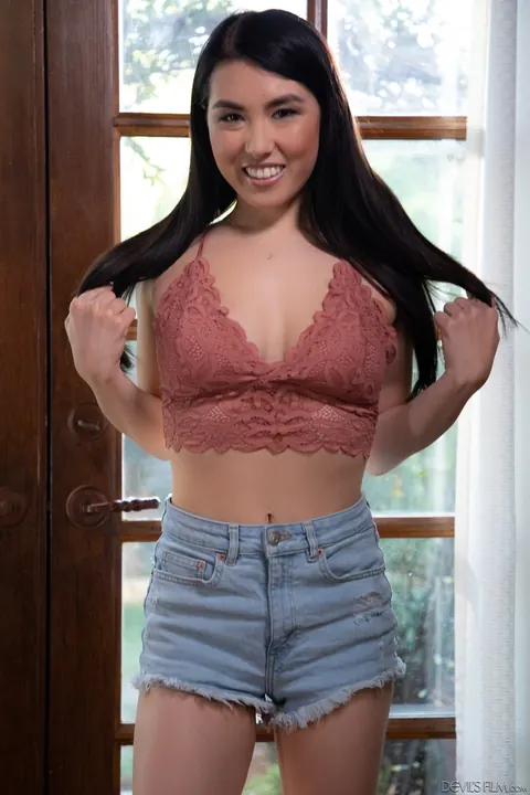 Sawyer Cassidy: Busty Asian Brunettes Share a Cock on a Leather Sofa – photo 1 of 15