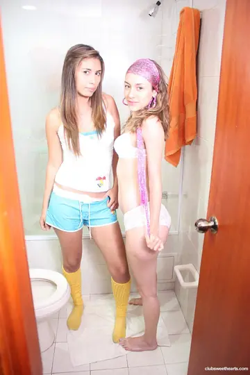 Two Latinas in Stockings and Shorts Have Lesbian Sex