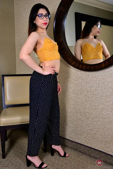 Venezuelan Latina in Glasses Bends Over and Spreads Her Ass by the Mirror