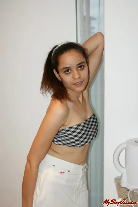Jasmine Mathur: Asian Brunette in a Skirt and Top Shows Her Bare Feet – photo 8 of 11
