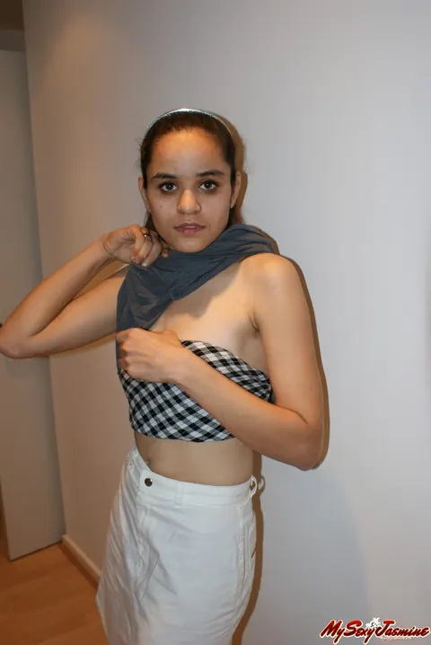 Jasmine Mathur: Asian Brunette in a Skirt and Top Shows Her Bare Feet – photo 6 of 11