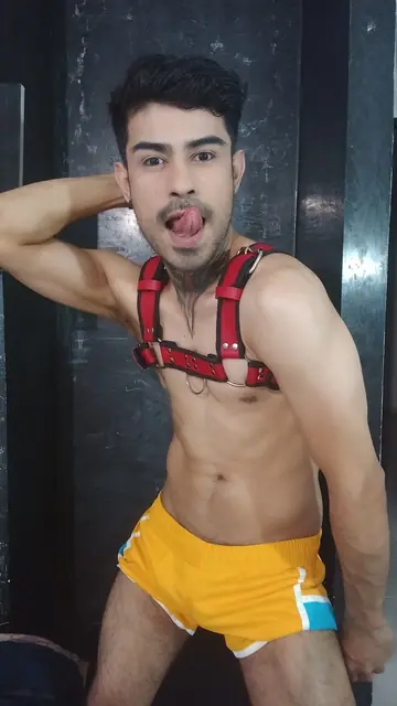 Man Strips Out of His Yellow Shorts