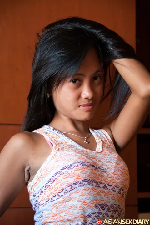 Petite Asian Woman Strips Nude and Poses for the Camera – photo 17 of 20