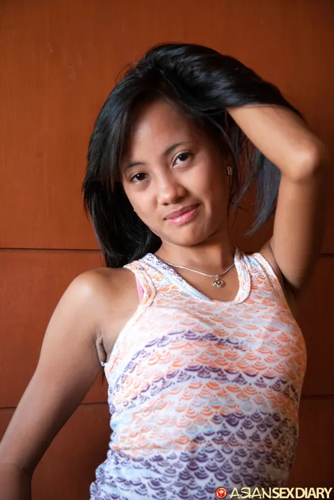 Petite Asian Woman Strips Nude and Poses for the Camera – photo 18 of 20