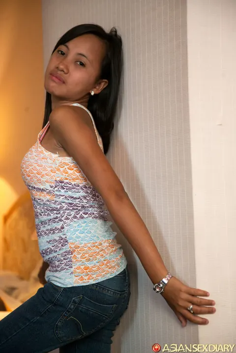 Petite Asian Woman Strips Nude and Poses for the Camera – photo 8 of 20