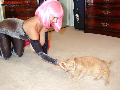 Chloe Vevrier: French MILF Peels Down Pink Bodystocking to Reveal Her Big Tits – photo 11 of 16