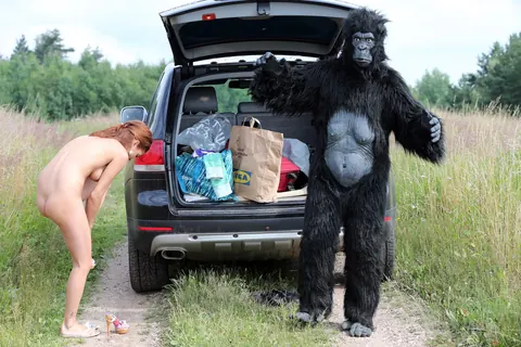 Woman Kisses and Fucks Gorilla-Suited Man Outdoors – photo 15 of 20