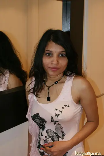 Busty Indian MILF Shows Off Her Short Dress