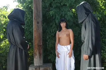 Roxyn – Brunette with Small Enhanced Tits Bound in Restraints