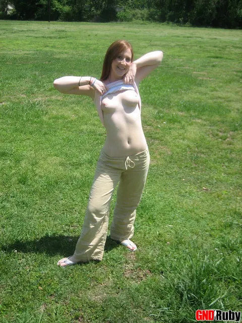 Redhead Bares Her Breasts and Spreads on Playground – photo 7 of 12
