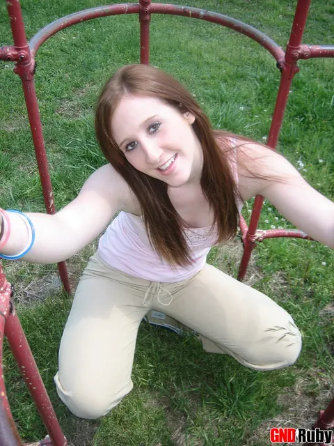 Redhead Bares Her Breasts and Spreads on Playground – photo 3 of 12