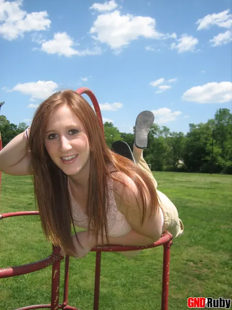 Redhead Bares Her Breasts and Spreads on Playground – photo 12 of 12