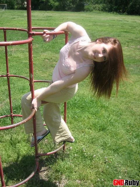 Redhead Bares Her Breasts and Spreads on Playground – photo 8 of 12