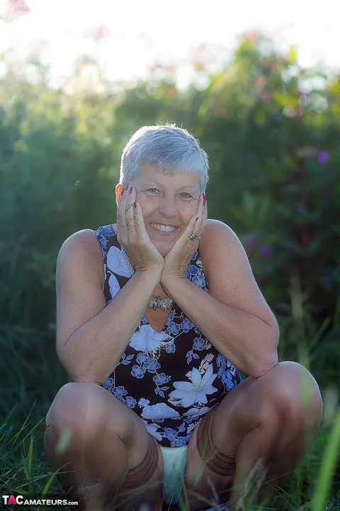 PAWG Silver-Haired Granny Spreads Her Shaved Pussy Outdoors in Stockings – photo 16 of 16