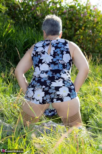 PAWG Silver-Haired Granny Spreads Her Shaved Pussy Outdoors in Stockings