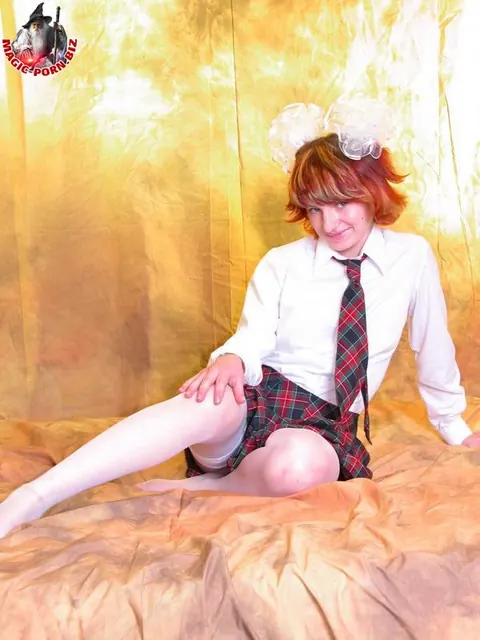 Redhead Strips Out of Her Uniform and Stockings – photo 6 of 17