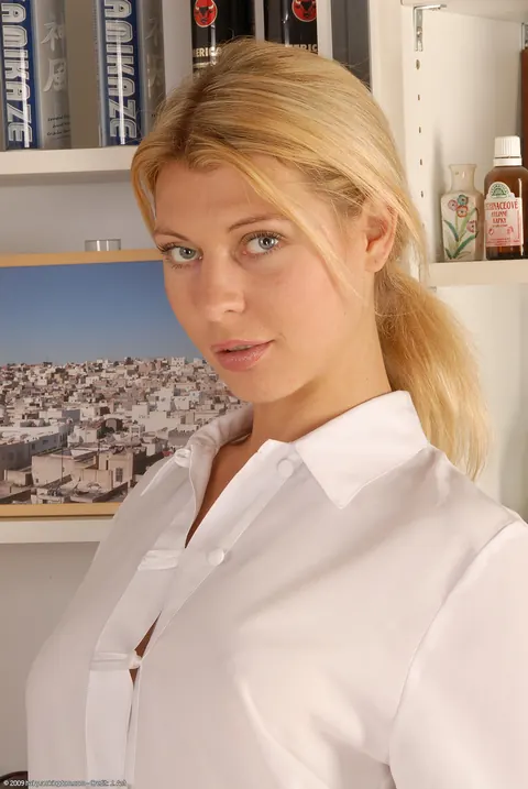 Blonde with Big Tits Pulls Aside Her Pantyhose and Spreads Her Hairy Pussy – photo 4 of 21