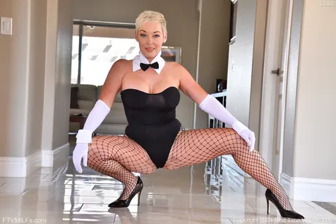 Busty Blonde MILF Strips Off Her Costume and Pantyhose in High Heels – photo 5 of 21