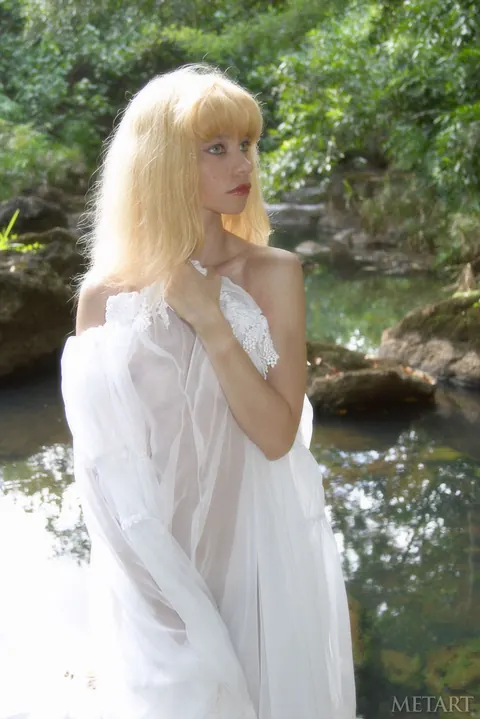 Blonde Strips Out of Her Skirt in the Forest – photo 12 of 21