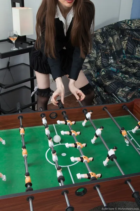 Rose Nore: Slim Russian Brunette Spreads Her Hairy Pussy Over a Foosball Table – photo 3 of 21