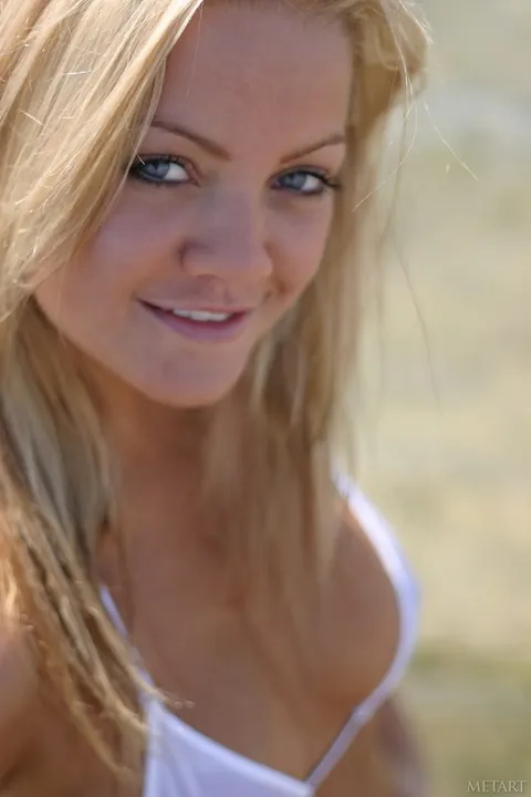 Thick Blonde Shows Her Big Ass and Round Tits in a Bikini Outdoors – photo 5 of 20