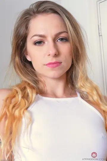 Blonde with Small Natural Tits Poses Nude and Displays Her Tattoo